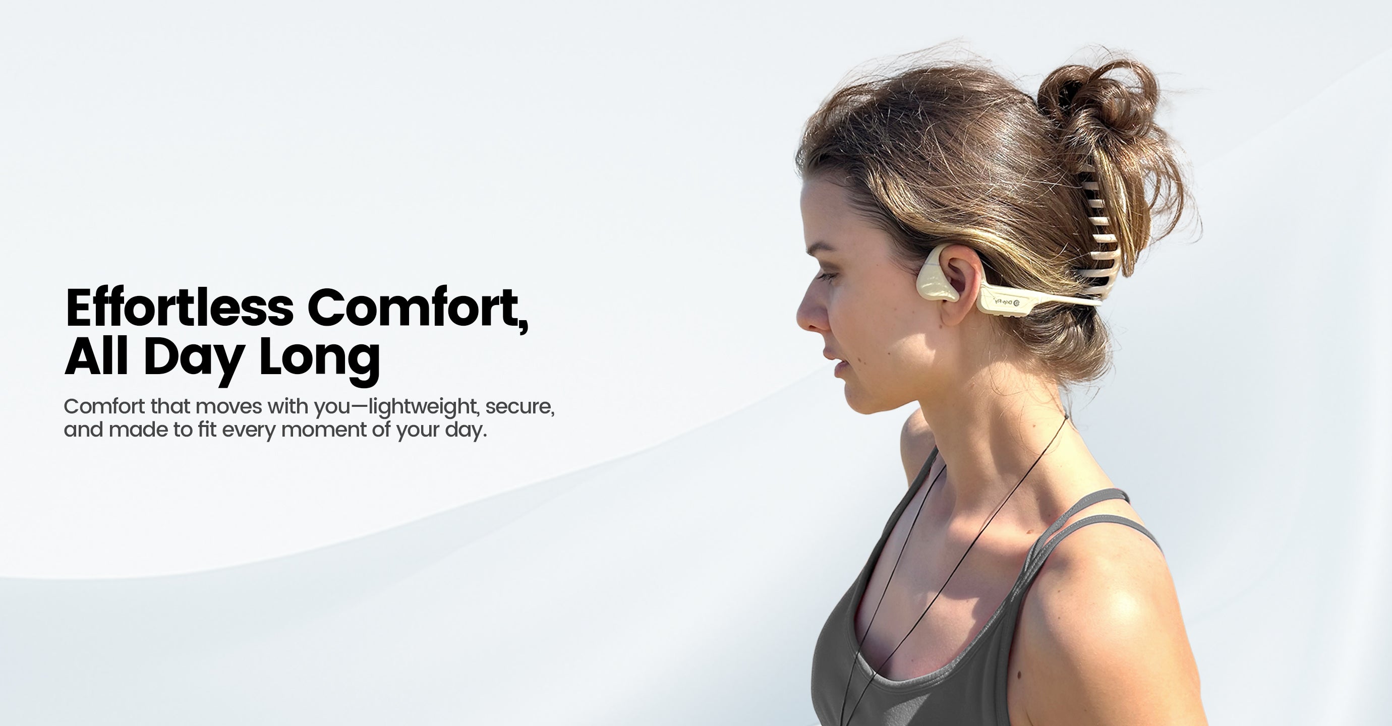 Woman wearing wireless earbuds with text about comfort and ease of use.