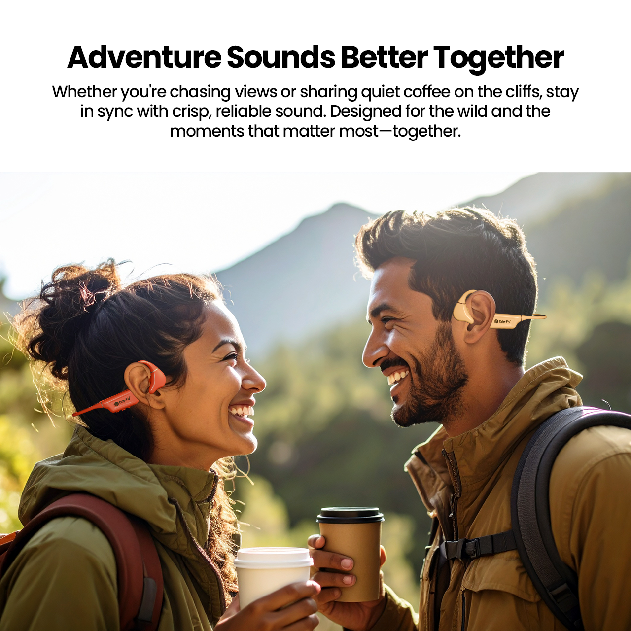 Two people hiking with coffee and earbuds, surrounded by nature.